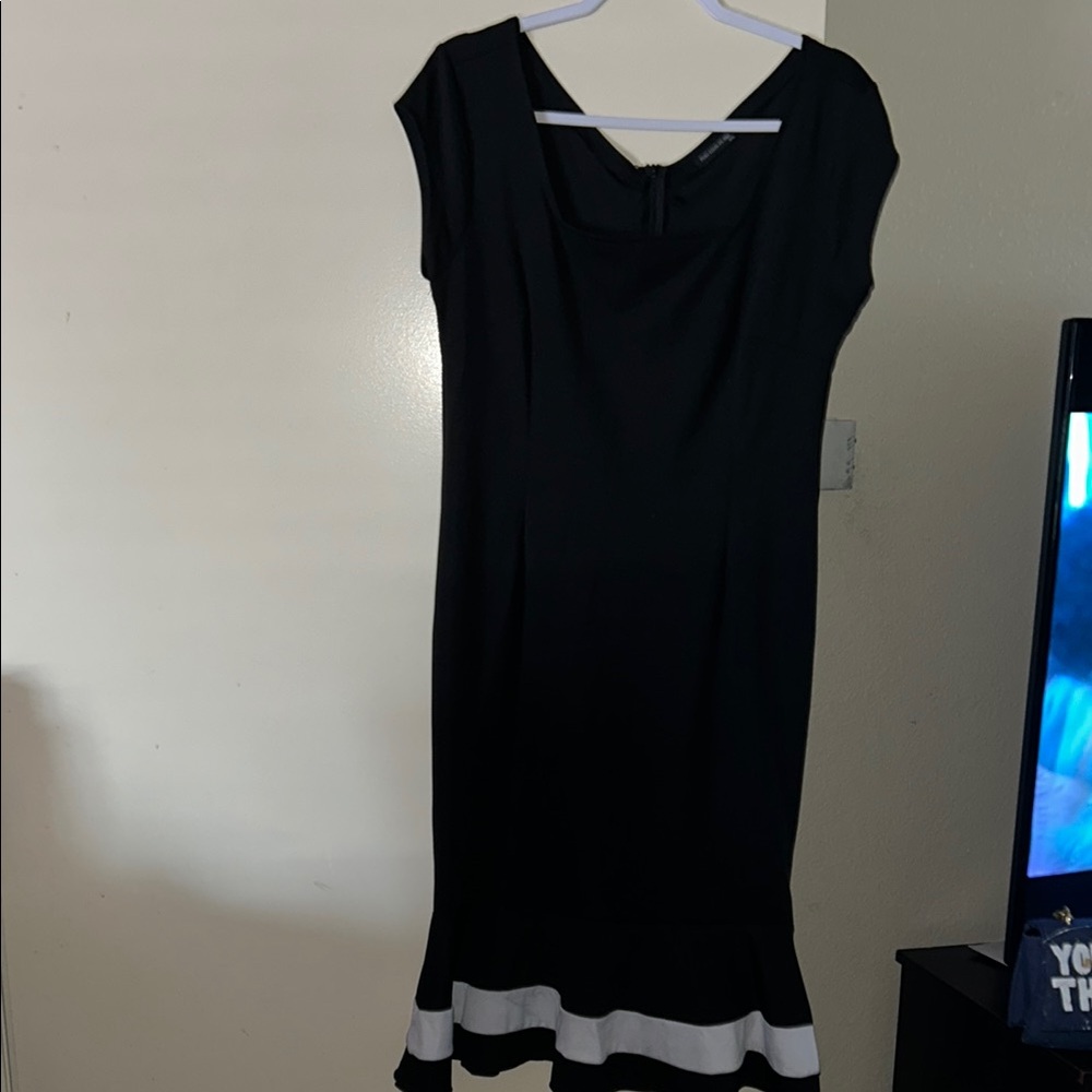 Elegant Black Dress with White Trim
